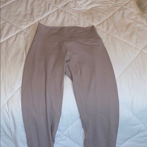 never worn, light pink lululemon leggings, size 4.